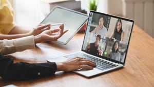 Worker at home on video call