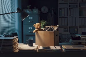 box on desk filled with personal belongings