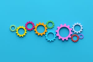 Cogwheels or gears on blue background