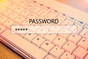computer password entry box overlaying a keyboard