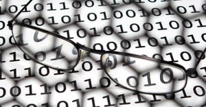 glasses on binary data background