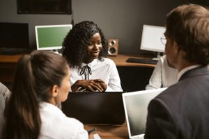 employees working together at workstation