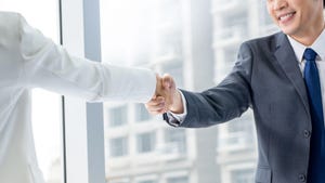 two business people shaking hands