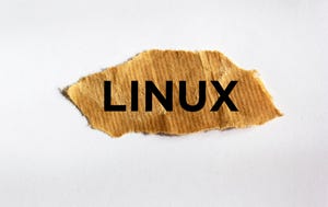 Linux text on brown torn paper