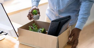 employee packing a box