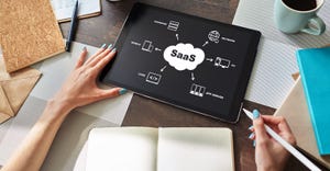 SaaS written on a technology background